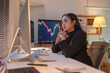 © Phimwilai - Businesswoman thinking, considering calculation of benefits, spreadsheet, financial development graph, statistics, economy, data analysis, investment analysis, stock market on PC computer in office.
