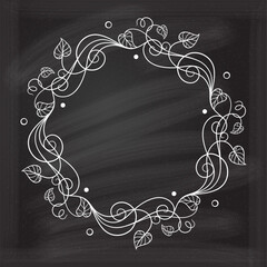 Wall Mural - an elegant vintage style floral wreath on a chalkboard background, perfect for a variety of invitati