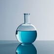 © Md Mojammel - Laboratory glassware with blue liquid, science laboratory research and development concept
