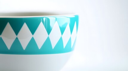 Wall Mural - Turquoise and white geometric triangles on a ceramic pot isolated on white, showcasing vibrant contemporary design