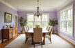 © NS Frames - Spacious dining room with soft lavender walls and a large wooden dining table surrounded by cream colored chairs
