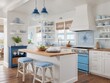 © Siti - coastal kitchen with white and blue decor, wooden countertops, and beachy accents