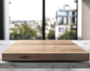 Aufkleber - Empty light brown wooden square board on a white marble surface against a blurred city view.