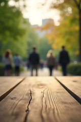 Poster - Wooden tabletop texture amidst blurred figures in a serene Park City landscape, exuding a sense of natural elegance and subtle atmosphere._00001_