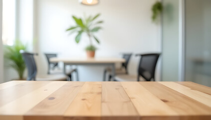 Aufkleber - The wooden table top is in sharp focus against a blurred white wall with reflective glass background elements._00001_