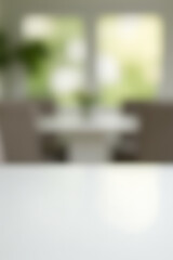 Aufkleber - The white table top is in sharp focus while its surroundings are intentionally blurred into an abstract background._00001_
