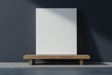 Wall Mural - Empty Canvas on Minimalist Wooden Stand Against Dark Wall