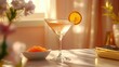 © Aziz - Cocktail, orange slice, caviar, bright room, elegant table.