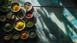 © Terablete - Colorful arrangement of spices in bowls on a wooden table in a marketplace