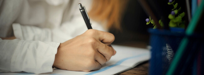 Wall Mural - planner plan schedule calendar and reminder agenda, work online at home. women hand writing daily ap