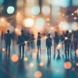 © milenialdesastudio - Silhouetted figures interconnected by glowing lines, representing networking and connection in a city at night.