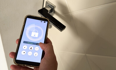 Poster - Smart house, home automation, device with App icons. Man uses his smartphone with smarthome app to control the lights of his house.