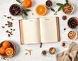 © Maryna - Blank antique recipe book lies open on white table. Various ingredients including oranges cherries spices, nuts arranged around. Image evokes vintage culinary concept. Suggests collection of recipes