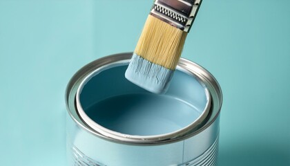 A scene of dipping a brush into an empty can and mixing paint