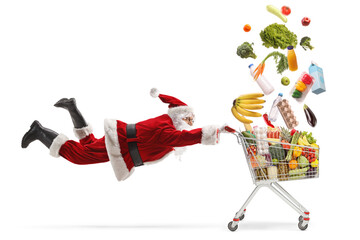 Poster - Santa claus flaying and holding a shopping cart with falling food products