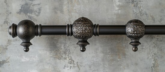 Poster - Elegant decorative curtain poles featuring ornate finials on a textured backdrop perfect for enhancing sophisticated interior decor