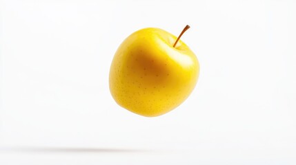 Poster - Yellow apple in mid-air against a white background showcasing vibrant color and smooth texture, perfect for fresh produce concepts.