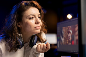 Poster - Video editor arranging recorded stock clips into seamless whole in creative multimedia agency. Videographer manipulating film pieces, assembling recorded footage into finished project, close up