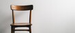 © AIArtistry - Vintage wooden chair beautifully showcased on a minimalist white background ideal for interior design concepts and home decor inspiration.