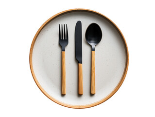 Elegant black cutlery set arranged on a minimalist round plate with natural wood accents in a modern dining setting