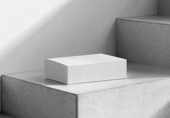 Poster - Minimalist White Box on Concrete Steps with Harsh Lighting and Clean Lines, Evoking a Sense of Simplicity and Modern Aesthetics in Contemporary Design