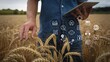 © MediaStockAI - Farmer Using Technology in Wheat Field for Modern Agriculture