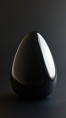 Poster - Obsidian stone glistens with deep black sheen and smooth surface for decorative or healing purposes