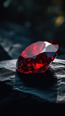 Poster - Radiant garnet gemstone displays deep red tones on a textured surface in captivating light