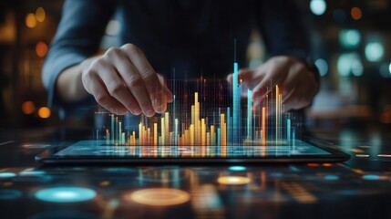 Fototapete - A person interacts with a digital tablet displaying colorful data visualizations and analytics in a modern, tech-focused environment.