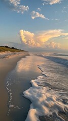 Poster - A tranquil evening walk along the sandy Georgia coastline with gentle waves and vibrant clouds at sunset