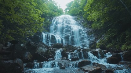 Poster - Amicalola Falls cascading over rocky cliffs surrounded by lush greenery at dawn