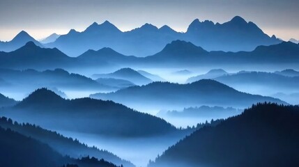 serene blue mountain range shrouded in mist.