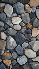 Poster - Textured arrangement of smooth pebbles reflecting natural beauty in an outdoor setting during daylight