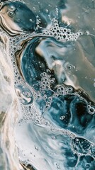 Poster - Macro shot capturing the intricate details of flowing water with tiny bubbles in a natural setting