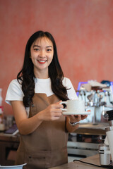 Wall Mural - Young barista making coffee, coffee preparation service concept.