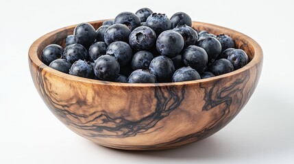 Poster - Fresh blueberries in a rustic wooden bowl on a clean white background showcasing vibrant colors and natural textures