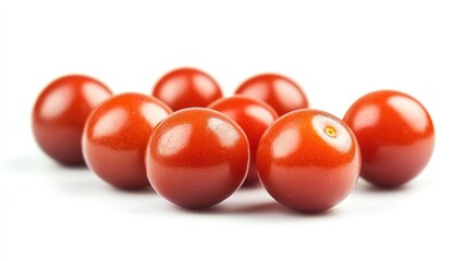 Poster - Ripe Barbados cherries arranged on a white background showcasing their vibrant red color and smooth texture for fruit illustrations
