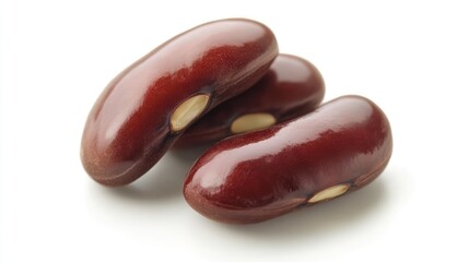 Poster - Red kidney beans on a white background showcasing their smooth texture and rich color for use in healthy food concepts and recipes.