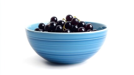 Poster - Black currants in a blue bowl on a white background showcasing freshness and vibrant color for food and health concepts