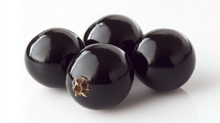 Poster - Glossy black currants arranged on a white background showcasing their vibrant color and natural shine highlighting their freshness and quality