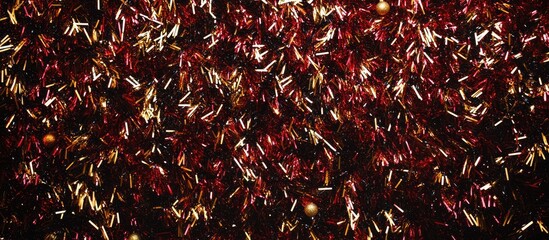 Poster - Festive holiday backdrop with vibrant tinsel shimmering in rich colors perfect for Christmas celebrations and seasonal photography.