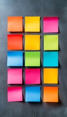 Poster - Wall covered in colorful sticky notes. The notes are arranged in a grid, with each one a different color. The wall appears to be a creative and colorful display
