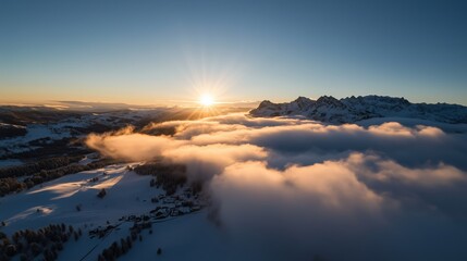 Wall Mural - stunning winter sunrise over mountains and valleys covered in clouds