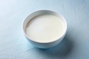 Sticker - Aerial View Milk Bowl Photography: Overhead Shot White Ceramic Bowl Fresh Milk Dairy Product