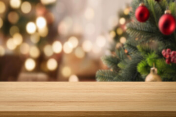 Wall Mural - Empty wooden table top blurred christmas tree with yellow bokeh on background. Christmas xmas tree with festive bokeh light holiday on wood table blur  room with a christmas tree background, suitable 