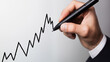 © bephoto - ビジネスマンの手と上昇するグラフ