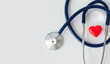 © Pawel - heart health, health insurance concept, yearly health checks and healthy trend. Red heart and stethoscope on blue background