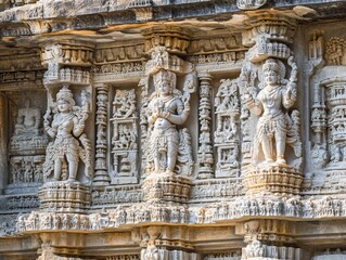 Ancient stone carvings depicting deities indian temple historical art cultural heritage close-up view sacred symbolism