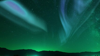 Wall Mural - galactic dreamscape milky way aurora above mountains loop