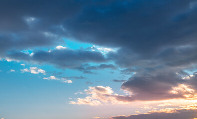 Wall Mural - sunset sky background. beautiful bright sunset sky with clouds.